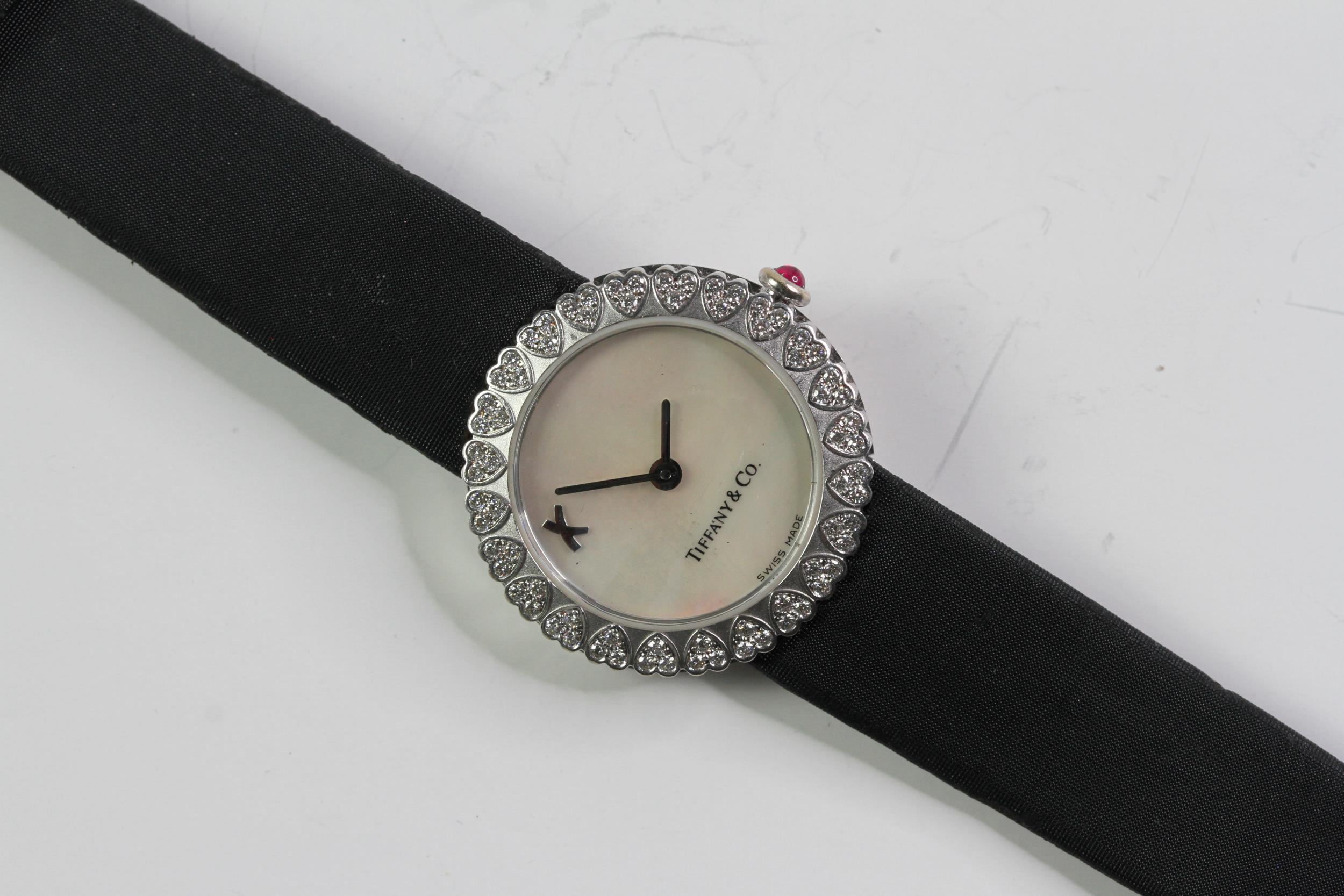 LADIES 18CT TIFFANY & CO KISS PICASSO QUARTZ WATCH, circular mother of pearl dial, diamond heart