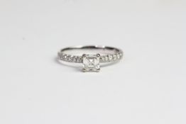 18ct square emerald cut diamond ring 4 claw set with diamond to a point shoulders HM, size L. F