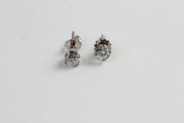 Brilliant cut diamond studs, 0.90ct total diamond weight, claw set with screw back fittings,