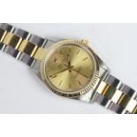 ROLEX OYSTER PERPETUAL 14233 CIRCA 1991, circular champagne dial with baton hour markers, 35mm case,