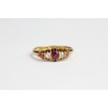 Ruby and diamond 5 stone carved half hoop ring