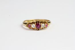 Ruby and diamond 5 stone carved half hoop ring