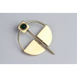 Cabochon cut green stone brooch