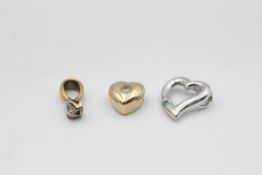 3 x 9ct gold diamond & clear gemstone set pendants inc. hearts & solitaire (1.9g)