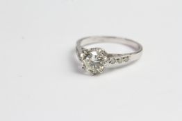 18ct 8 claw set diamond ring with millgrain set shoulders D0.90 plus sides. Stamped 18CT