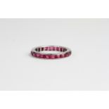 18ct Ruby full eternity ring with detailed sides. Ring size L1/2