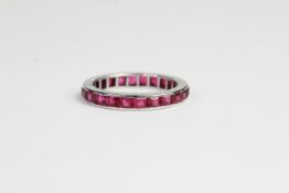 18ct Ruby full eternity ring with detailed sides. Ring size L1/2