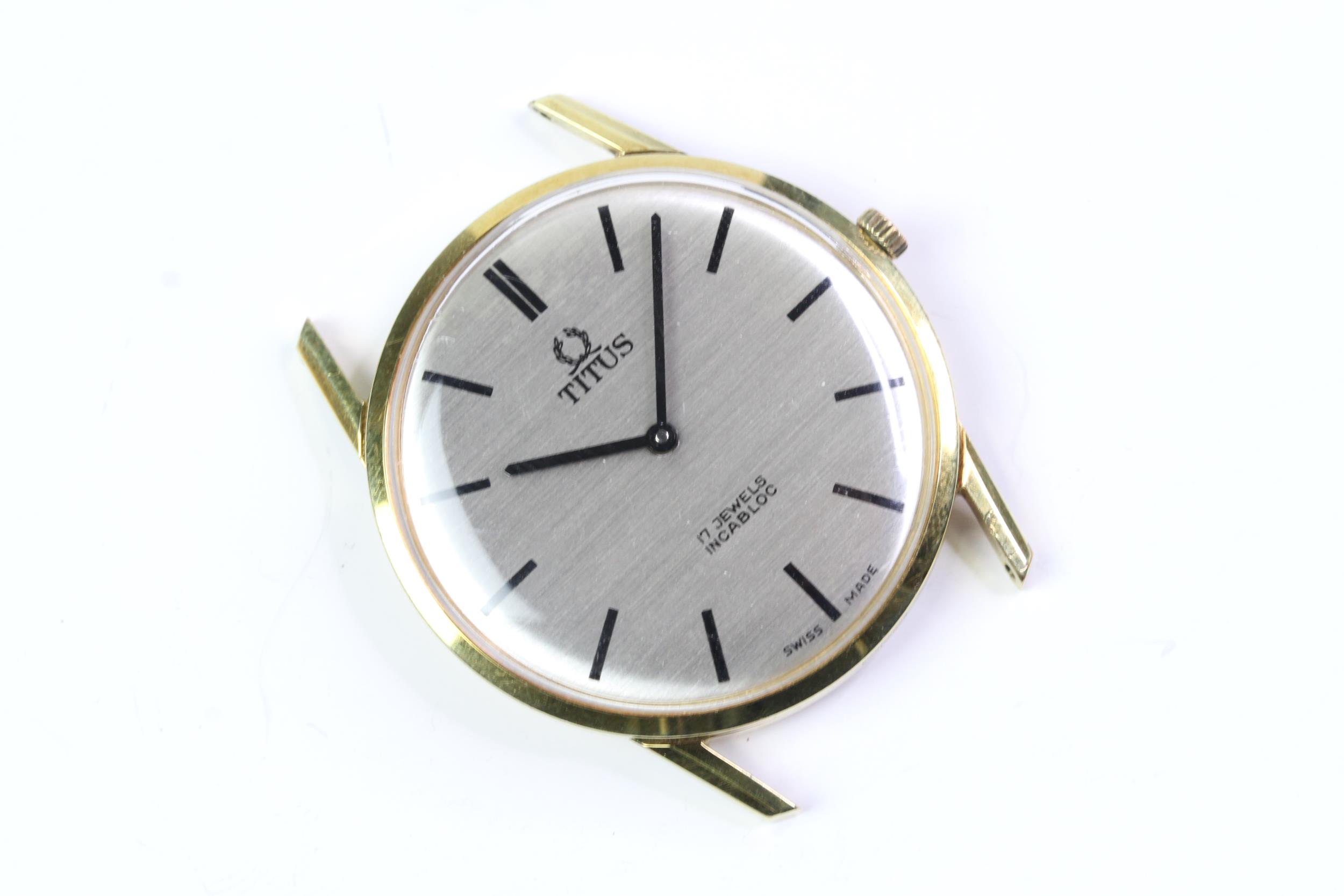 1960s Titus watch with grained dial, Gold plated stainless steel case 31mm with snap on case back,