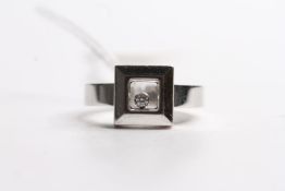 Chopard Happy Diamonds Ring, 0.05ct diamond, stamped 18ct white gold, size N, comes with a Chopard