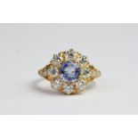 18ct Sapphire and diamond crown cluster ring with 3 diamonds on shoulders. S1.20 D 1.45