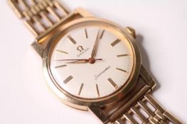 1950s 9CT OMEGA SEAMASTER WRIST WATCH, circular cream dial with baton hour markers, 34mm 9ct gold
