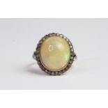 Silverset ethiopian opal and diamond ring, silverset and gold. Marked 585