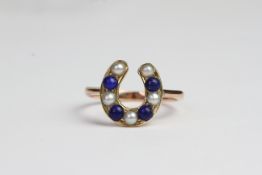 Pearl and lapis lazuli horse stone ring.