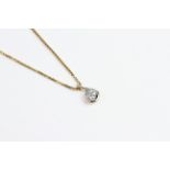 18ct diamond pendant and chain diamond set into a white gold swirl. Est D 0.40