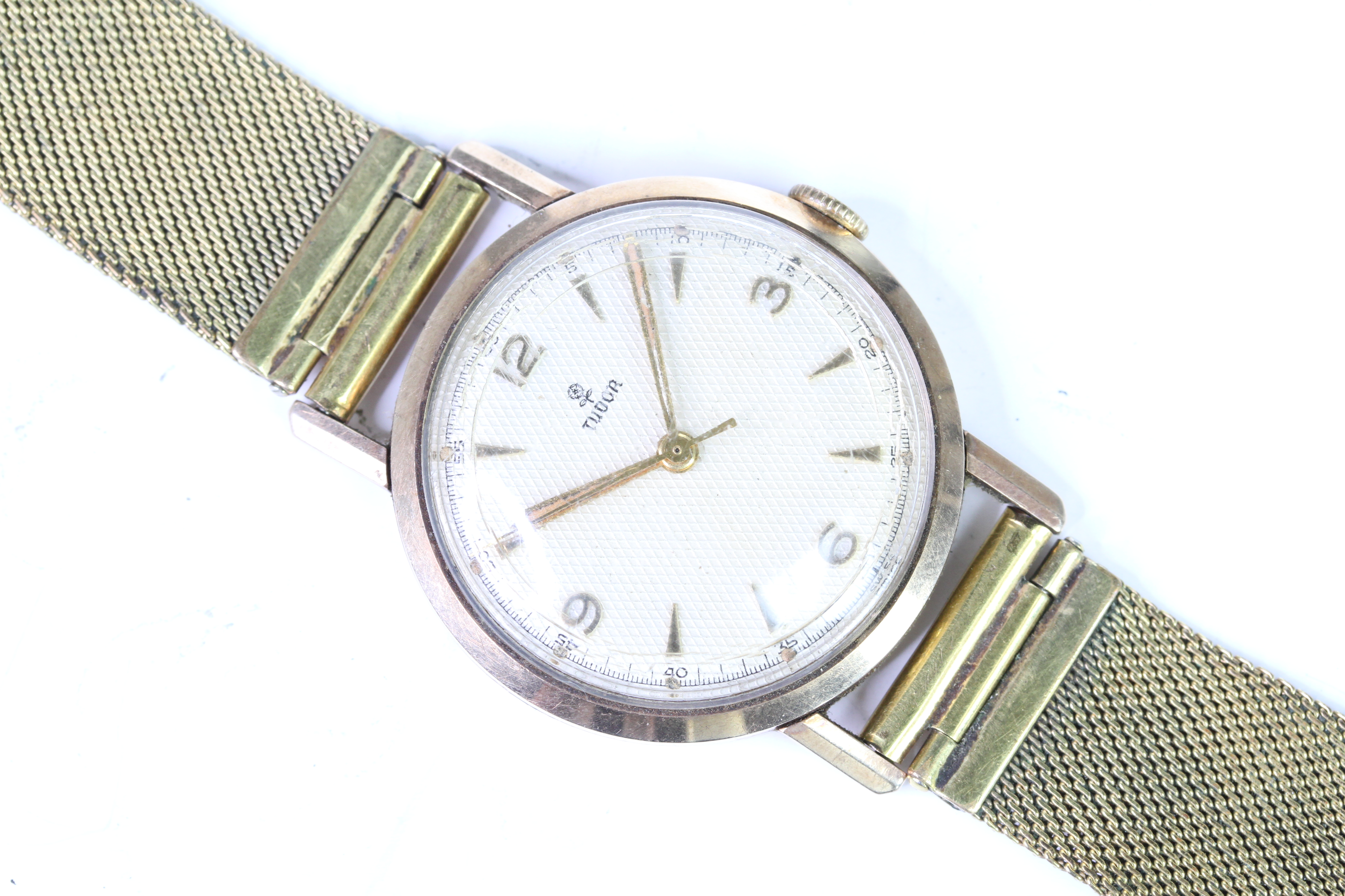 VINTAGE 1956 9CT TUDOR, cream honeycomb dial, gold hour markers, outer seconds track, 32mm 9ct case,