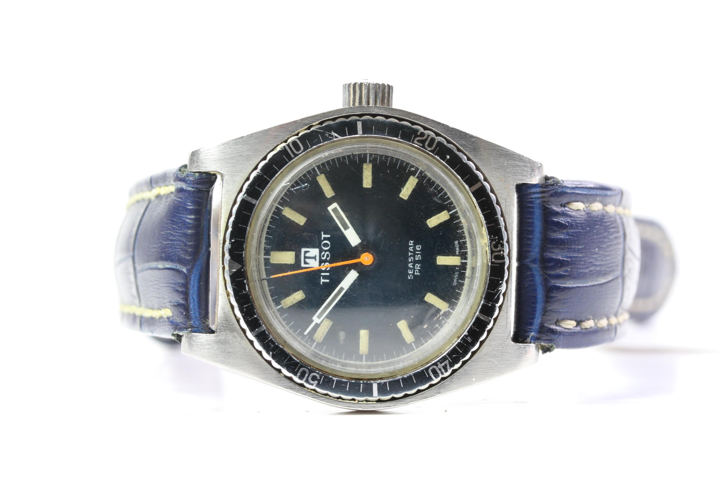 VINTAGE TISSOT SEASTAR PR516, blue sunburst dial, orange seconds hand,patina lume plots, rotating