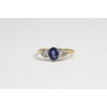 18ct & Platinum Oval sapphire and diamond 3 stone ring bezel set. S 1ct D 0.65ct in total