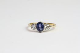 18ct & Platinum Oval sapphire and diamond 3 stone ring bezel set. S 1ct D 0.65ct in total