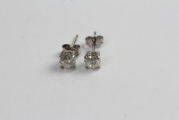 Brilliant cut diamond studs, 0.90ct total diamond weight, claw set with post and butterfly,