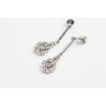 18ct long drop diamond earrings with circular backs. No weights known.