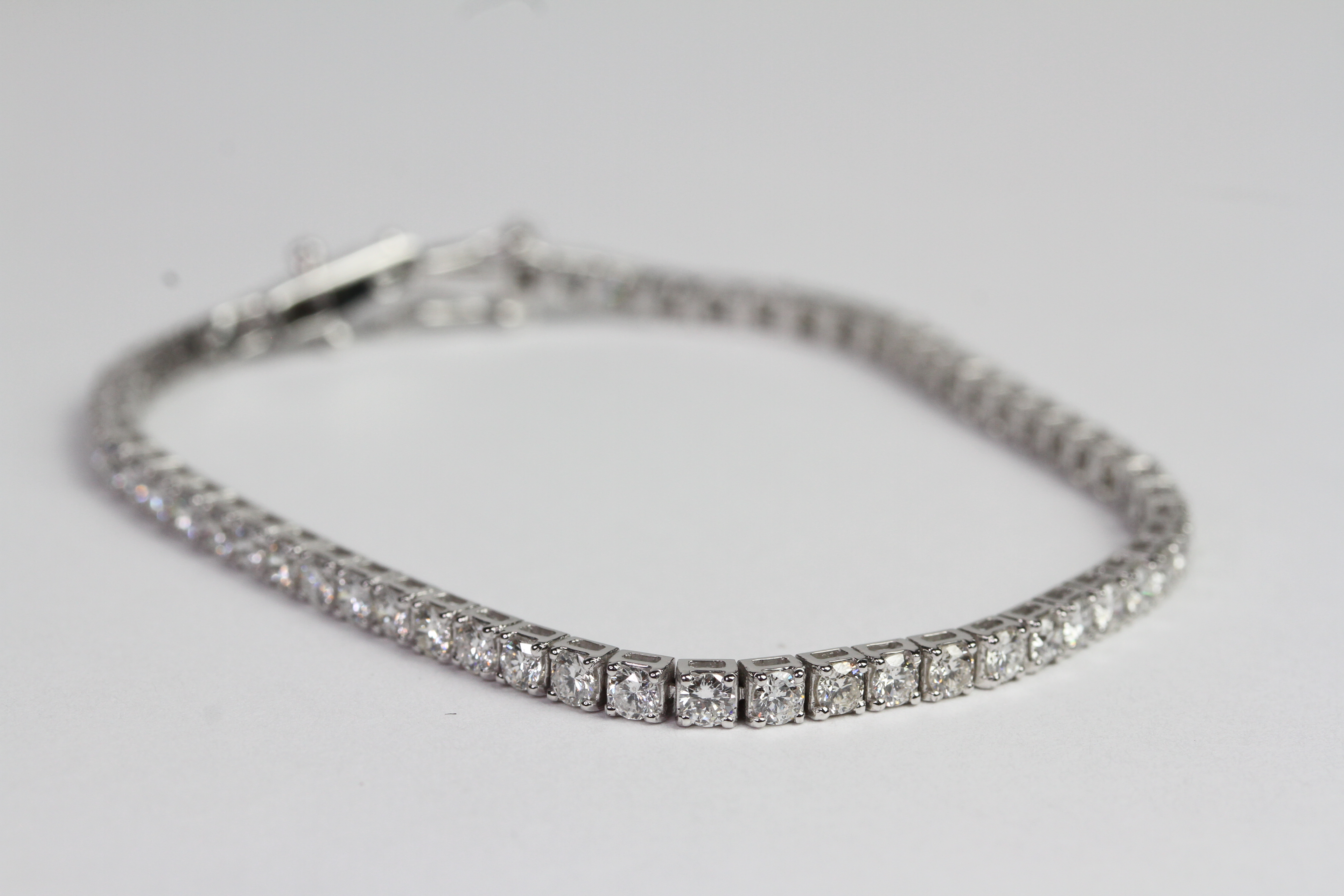18ct Diamond claw set line bracelet D3.80 58 diamonds. 2 ‘d’clip safety catches. - Image 2 of 2