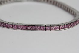 18ct pink sapphire bracelet PS 5 carats in total. 17.5cm