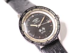 ROTARY GTO AUTOMATIC WORLD TIME CIRCA 1960s, circular black dial with baton hour markers, date