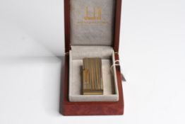 Solid 18ct Dunhill two tone Rollagas, white and yellow gold, singed and import mark to base,