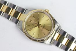 ROLEX OYSTER PERPETUAL 14233 CIRCA 1991, circular champagne dial with baton hour markers, 35mm case,