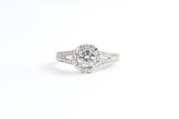 0.53ct Diamond Cluster Ring, centre diamond estimated 0.53ct, mounted with diamond surround and