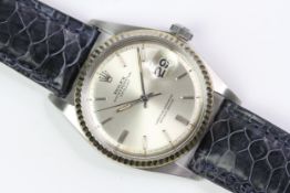 ROLEX DATEJUST 1601 CIRCA 1969, circular sunburst silver dial with baton hour markers, date function