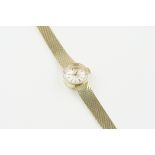 OMEGA 14CT YELLOW GOLD COCKTAIL WATCH, circular silver dial with hour markers and hands, 14mm 14ct