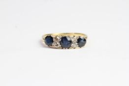 Sapphire carved half hoop ring