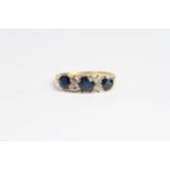 Sapphire carved half hoop ring