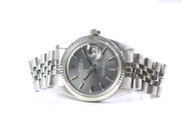 ROLEX DATEJUST 1603 CIRCA 1973, circular sunburst grey dial with baton hour markers, date function