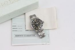 VINTAGE ROLEX SUBMARINER 5513 WITH SERVICE PAPERS CIRCA 1979, circular matte black dial with cream