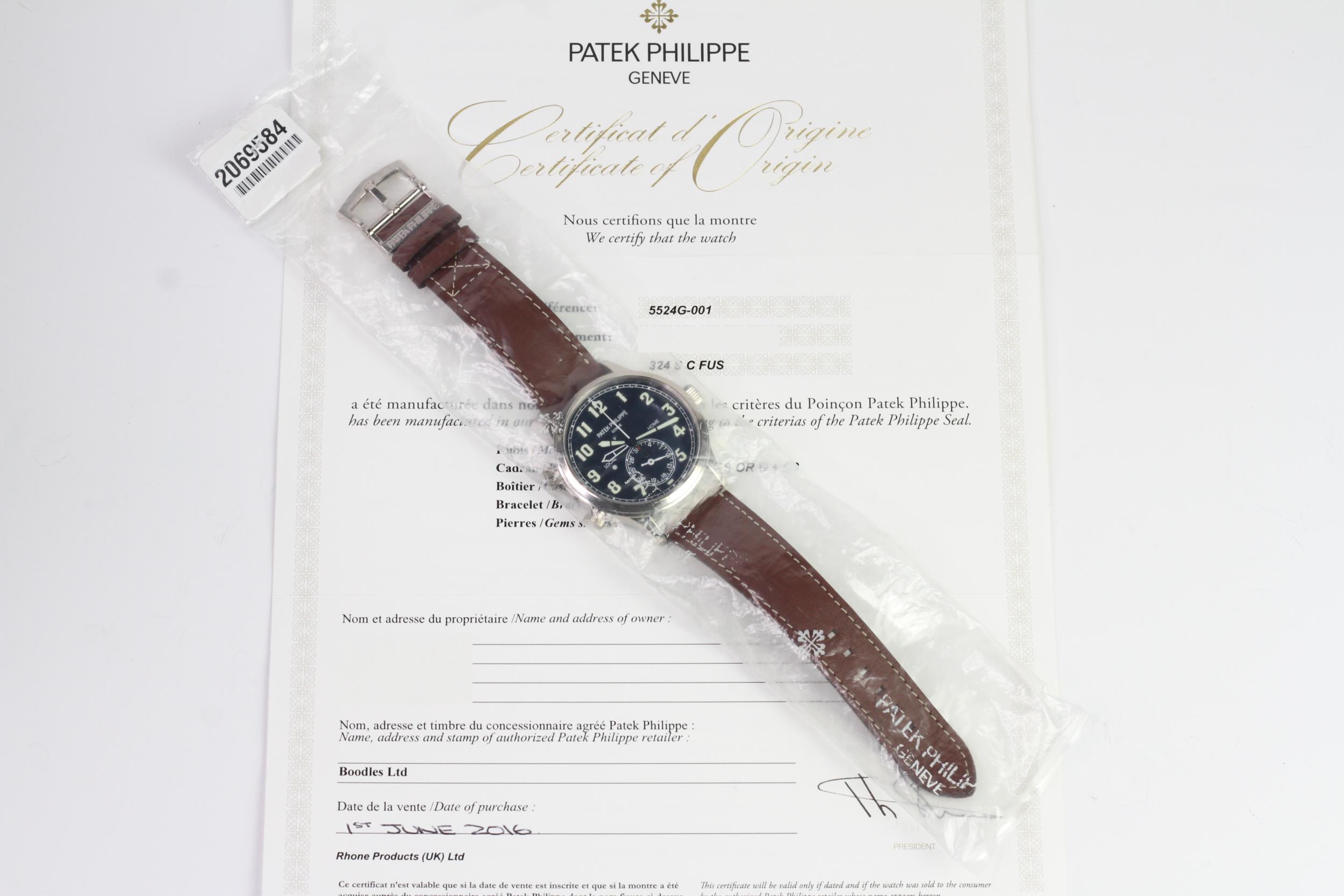 A FINE PATEK PHILIPPE CALATRAVA PILOT TRAVEL TIME REFERENCE 5224G-001, SEALED FROM SERVICE, WITH BOX - Image 4 of 19