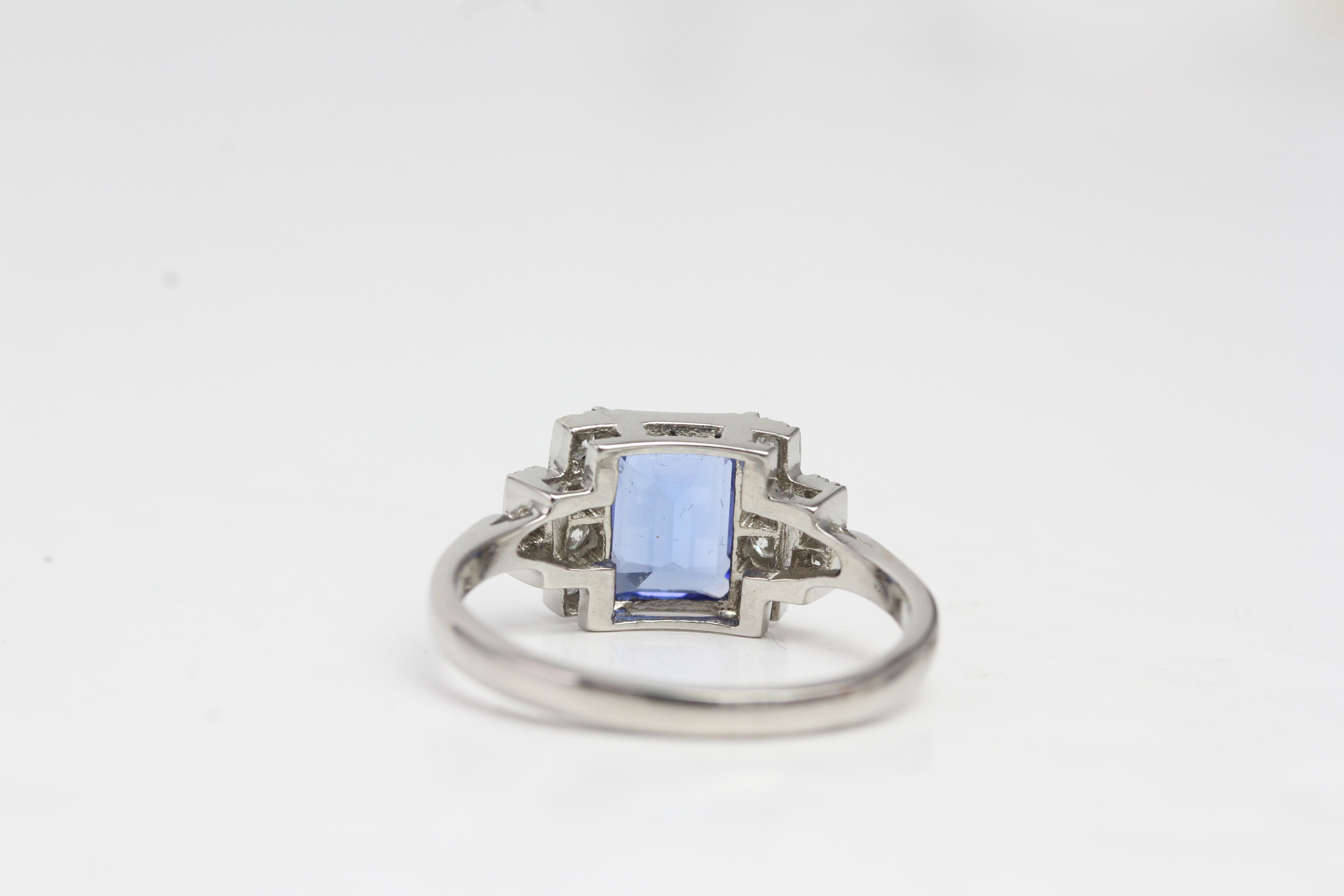 Platinum Tanzanite and diamond ring. Mille grainedged bezel set step cut tanzanite with - Image 3 of 3