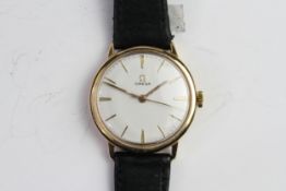 VINTAGE OMEGA 18CT DRESS WATCH, circular dial with gold hour markers, 34mm 18ct case, case back