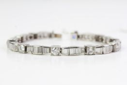 BAGUETTE AND BRILLIANT CUT DIAMOND BRACELET Estimated 2.85ct+, brilliant cut diamonds in square