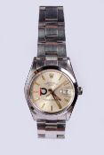 RARE ROLEX OYSTER PERPETUAL DATE 'RIG OF THE YEAR' WRISTWATCH REF. 15000 CIRCA 1982, circular silver