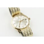 OMEGA 9CT GOLD AUTOMATIC GENEVE DATE WRISTWATCH, circular silver dial with hour markers and hands,