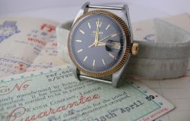 VINTAGE ROLEX DATEJUST 6605 WITH PAPERS 1959, circular black dial with applied hour markers, date