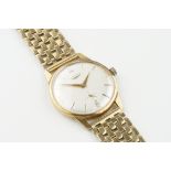 LONGINES 9CT GOLD WRISTWATCH, circular silver dial with hour markers and hands, 34mm 9ct gold case