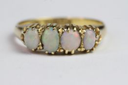 18ct Gold and 4 stone opal ring