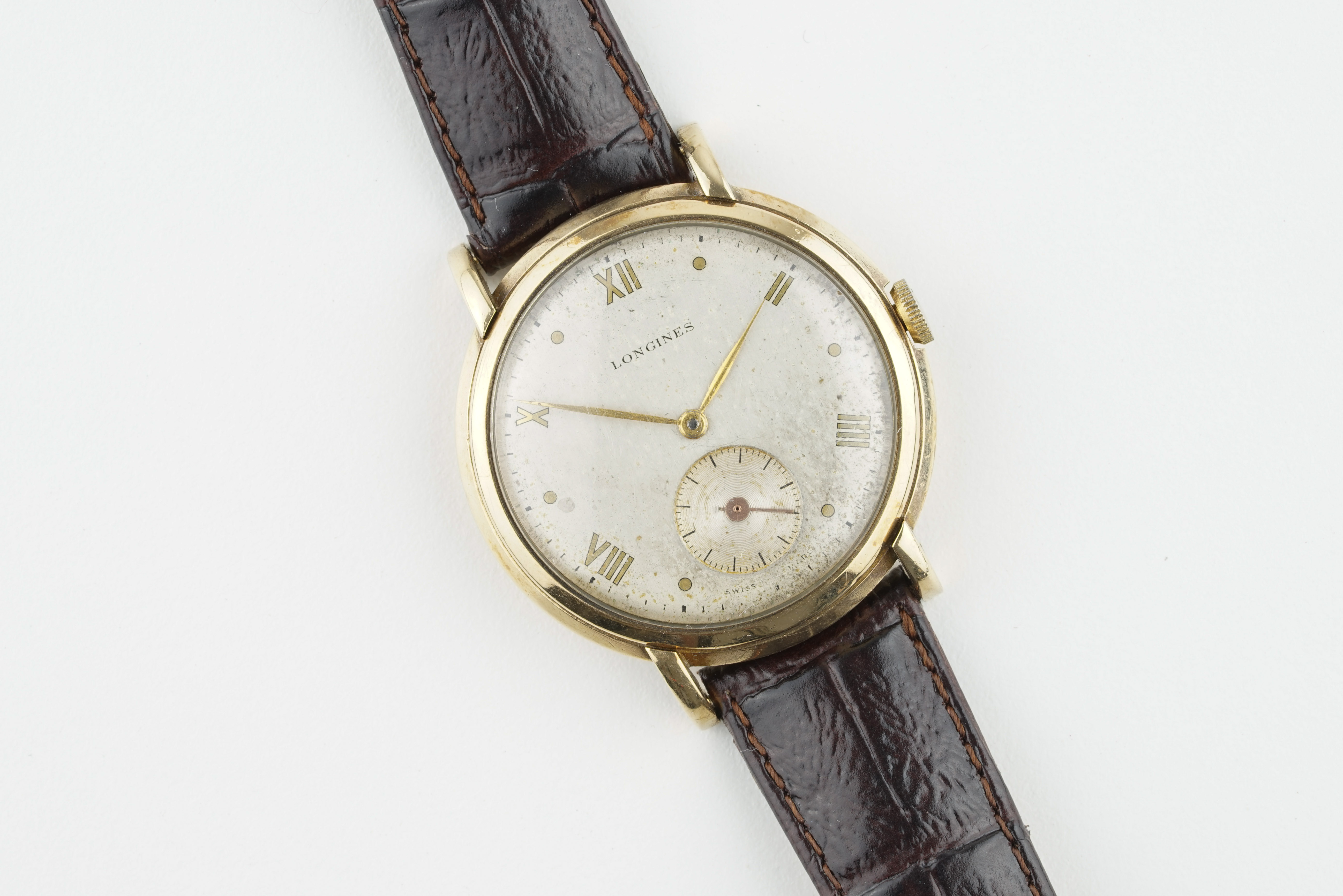 ***TO BE SOLD WIHTOUT RESERVE*** GENTLEMENS LONGINES 9CT GOLD WRISTWATCH, circular silver dial