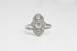 Platinum diamond Deco style ring with central bezelset brilliant cut in a ladder of baguettes