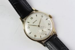18ct VINTAGE ZENITH DRESS WATCH, cream dial with Arabic numerals and Arrow hour markers,