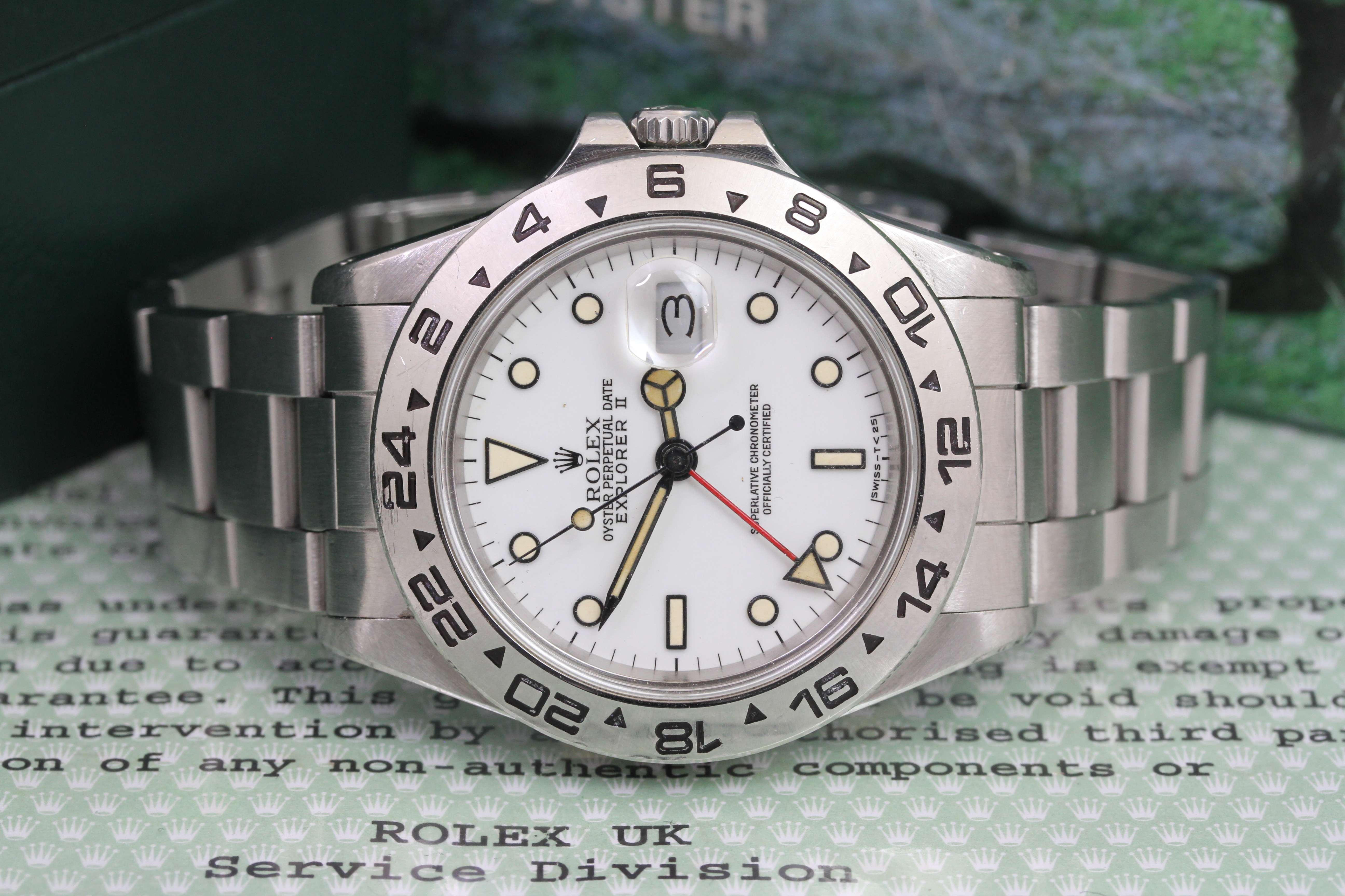 ROLEX EXPLORER II 16550 CIRCA 1988 BOX AND SERVICE PAPERS, circular white dial with patina lume hour - Image 2 of 2