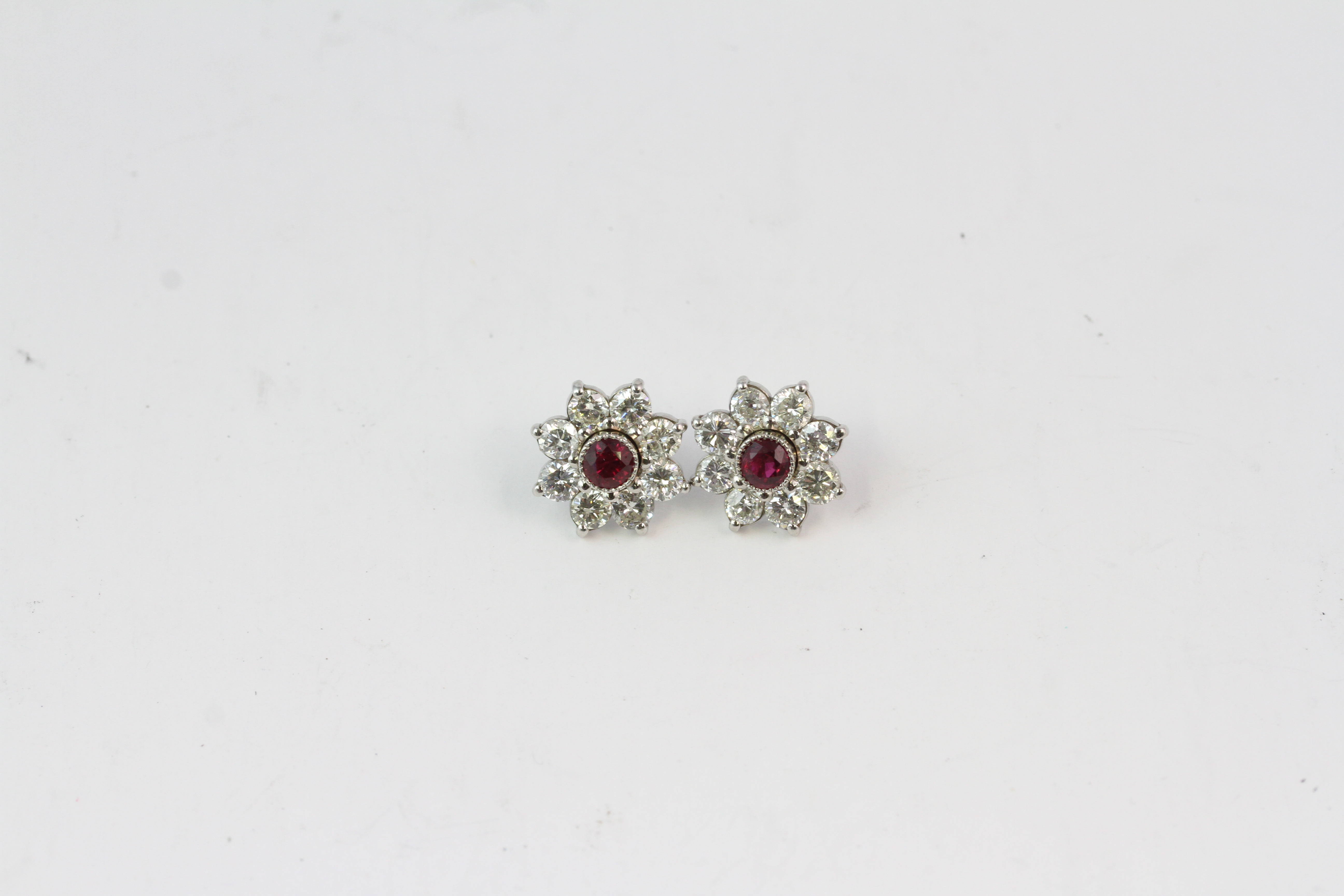 Ruby? And diamond cluster earrings Est 1.60ct diamonds